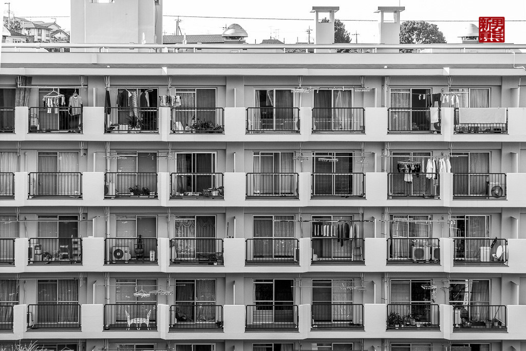Monochrome Balcony Grid With Seal