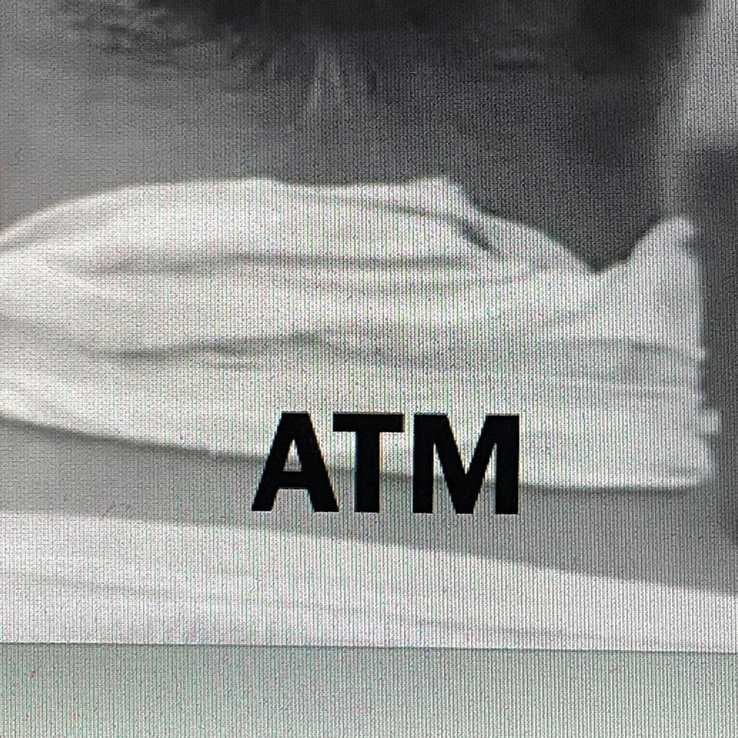 Grainy Monochrome Text-Over-Image Graphic
