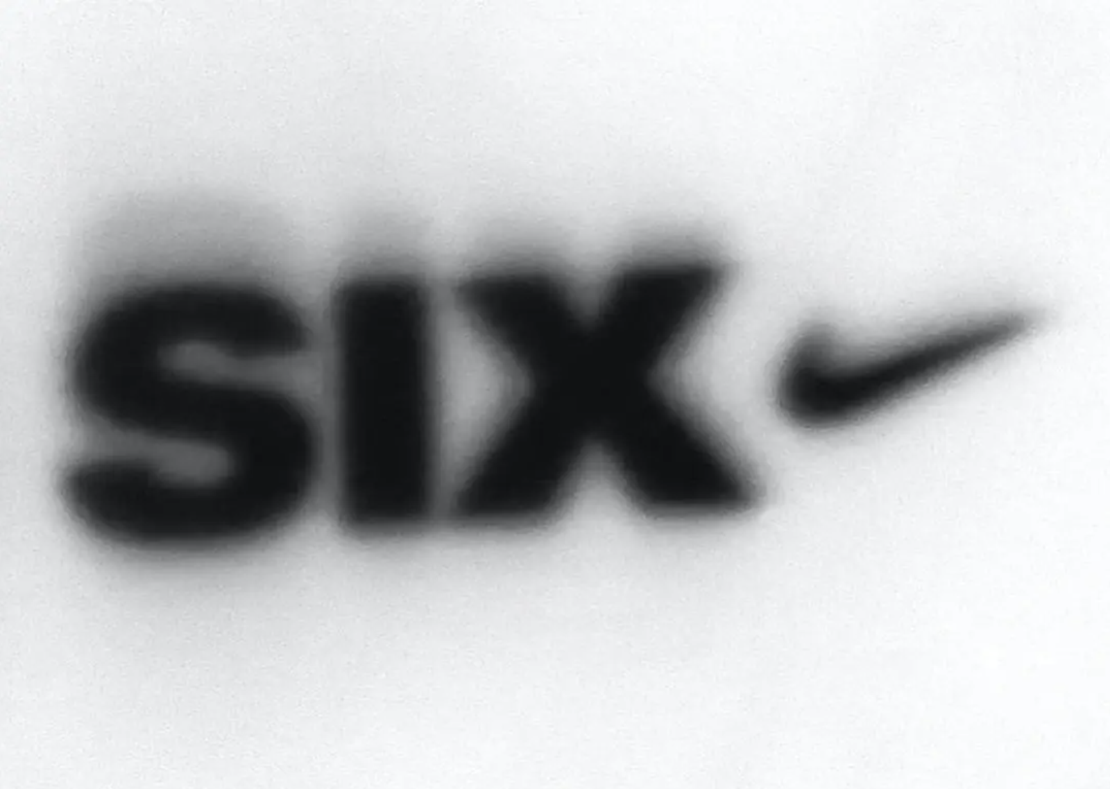 Blurred SIX Swoosh Wordmark